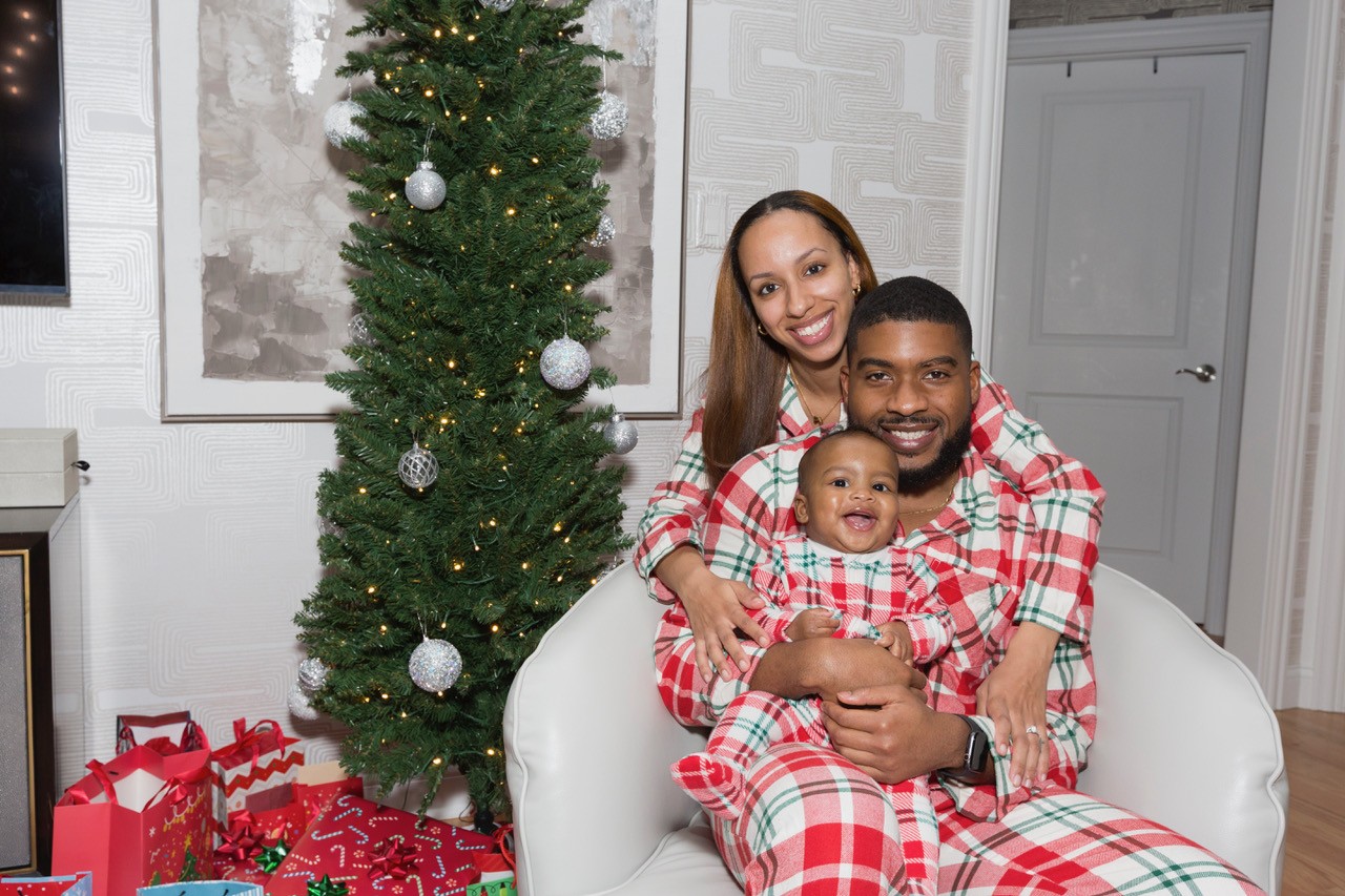 Dion with wife and son at Christmas
