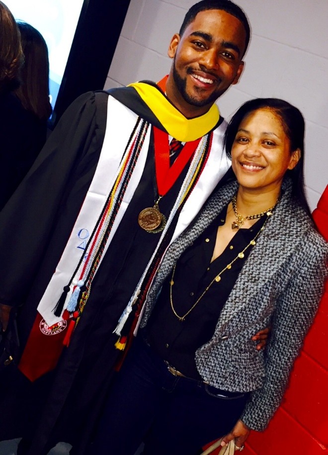 Khalil at college graduation with his mother